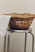 RATTAN BASKET WITH A SCALLOPED EDGE