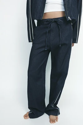 DENIM PANTS WITH SIDE BANDS