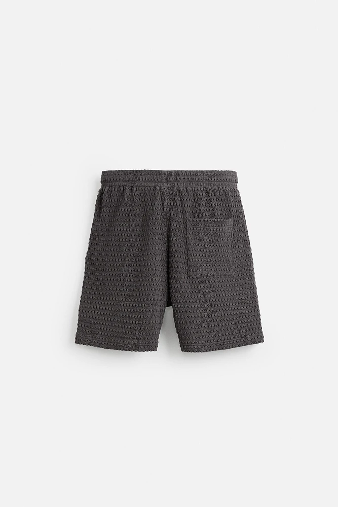 IRREGULAR TEXTURED BERMUDA SHORTS