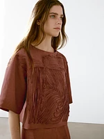 Top fluide avec broderie