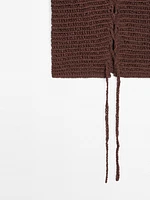 Veste sans manches lacée en crochet de coton mélangé
