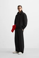 TECHNICAL QUARTER-ZIP SWEATSHIRT