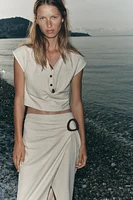 BUCKLE MIDI SKIRT