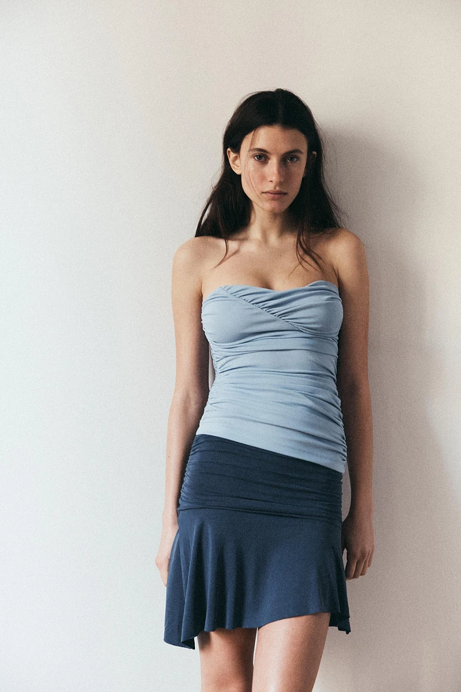 ASYMMETRIC MINI SKIRT