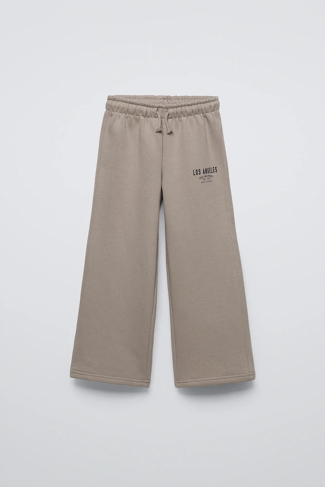 PLUSH WIDE LEG TEXT PANTS