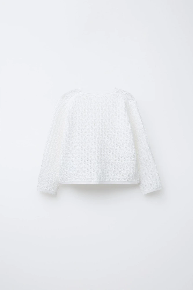 GILET EN MAILLE AJOURÉE