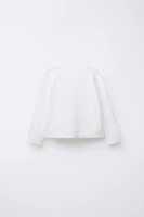 GILET EN MAILLE AJOURÉE