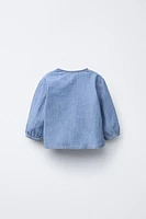 CHEMISE EN JEAN FLUIDE À COL TUNISIEN