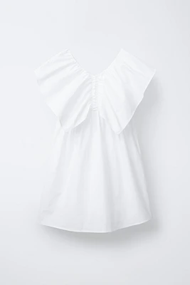 ROBE À VOLANT