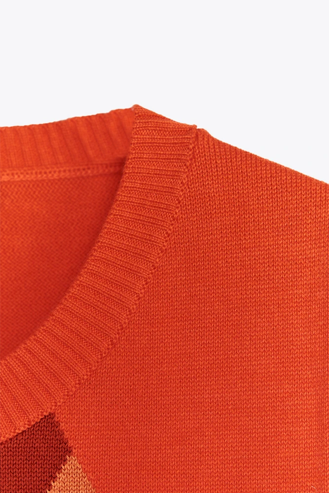 TOP GILET EN MAILLE À LOSANGES