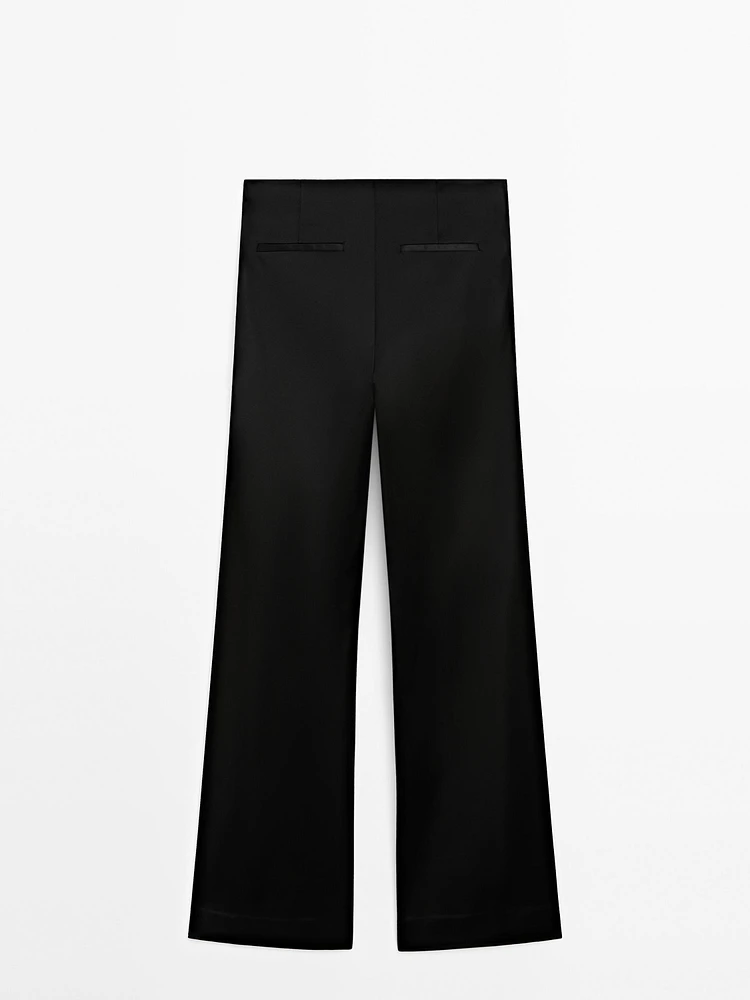 Satin flared trousers with vents