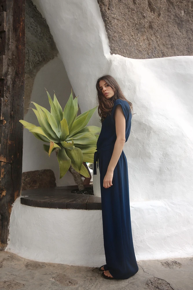 BELTED CREPE JUMPSUIT