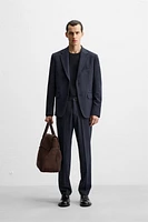 TEXTURED SUIT BLAZER