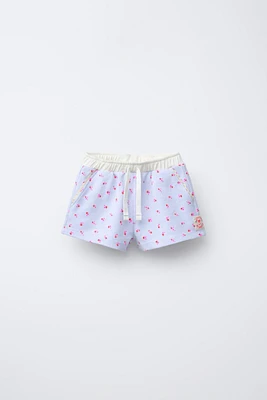 SHORT À FLEURS EN DENTELLE