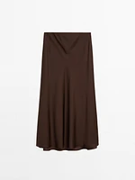 Jupe midi fluide en tissu satiné