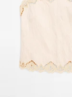 Flowing top with blonde lace detail