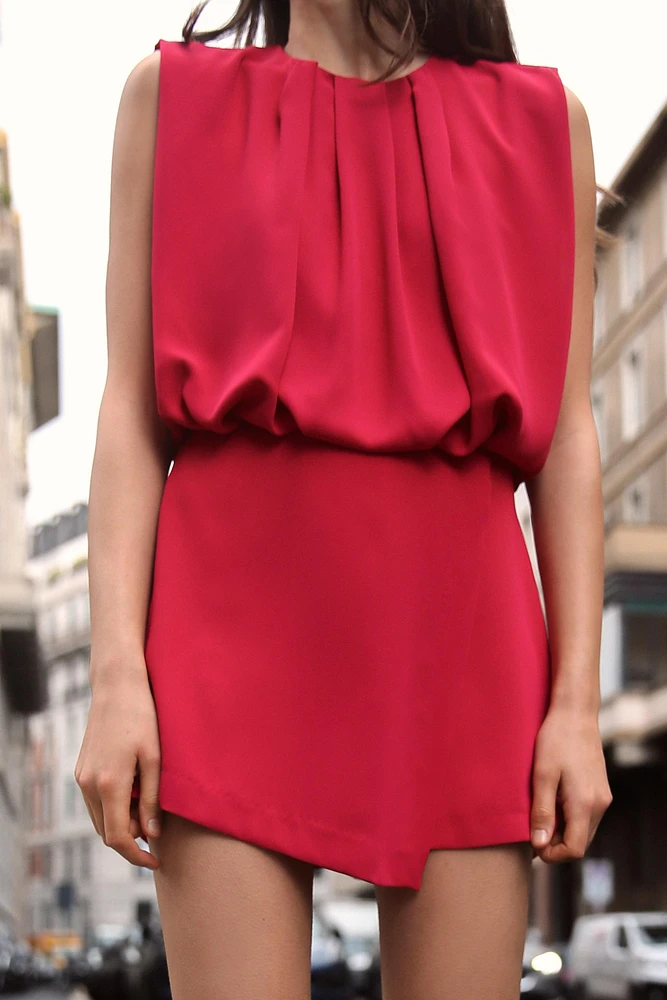 SLEEVELESS SHORT JUMPSUIT