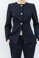 VESTE AJUSTÉE À COL ROND