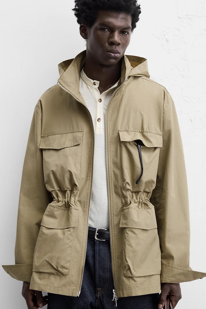 TECHNICAL PARKA WITH POCKETS