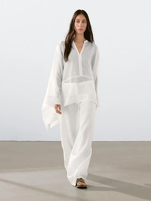 Semi-sheer long flowing shirt