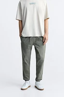 PANTALON DÉLAVÉ AVEC TAILLE JOGGING
