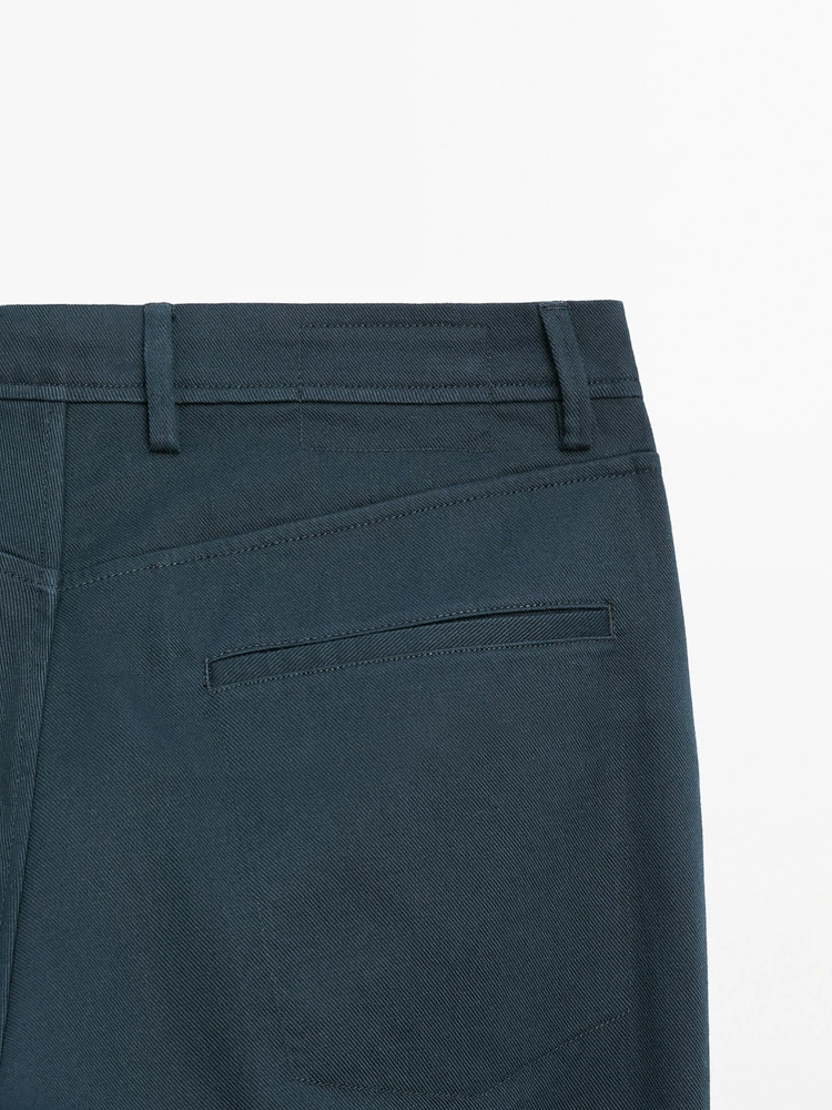 Faux jean tapered fit en coton mélangé