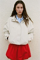 VESTE À CAPUCHE