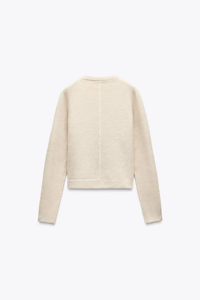 KNIT SWEATER WITH CONTRASTING PIPING