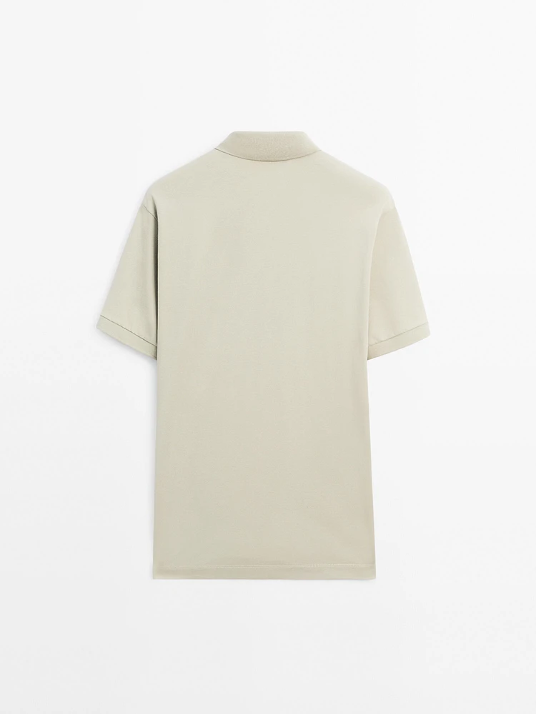 Cotton blend polo shirt with snap button