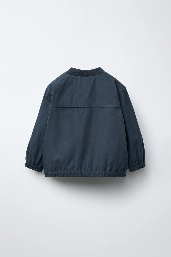 BLOUSON BOMBER LÉGER À TEXTE BRODÉ