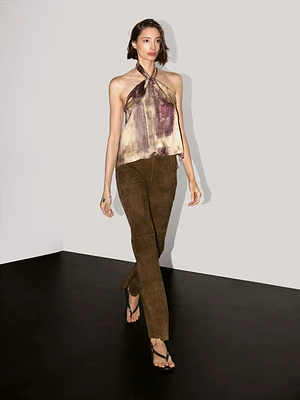 Pantalon flare en cuir finition daim