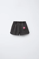 SMILEYWORLD ® WASHED EFFECT PLUSH SHORTS