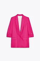 VESTE À MANCHES RETROUSSÉES