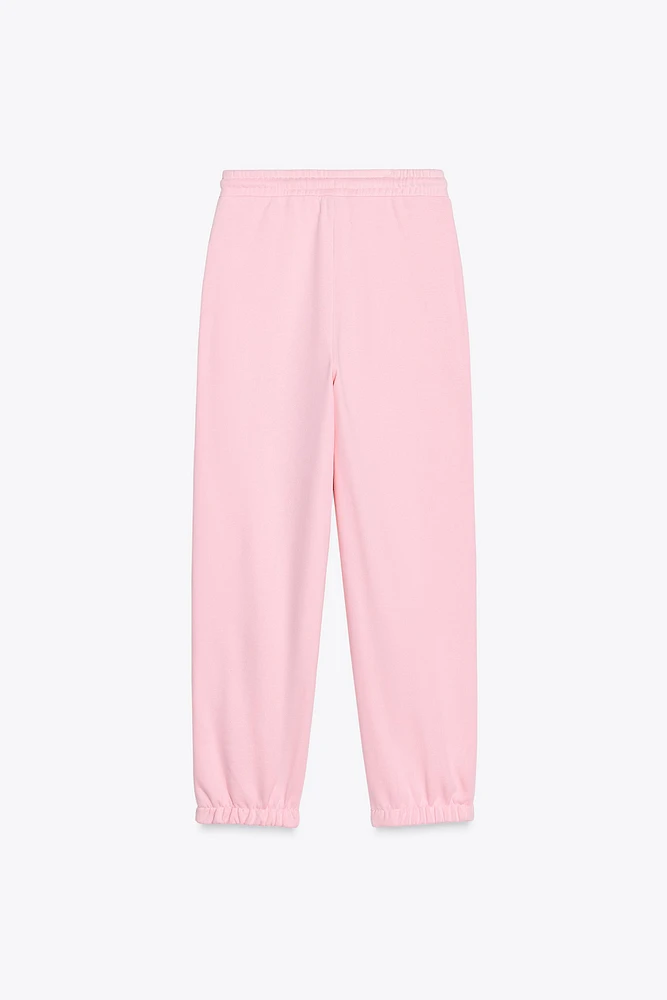 THE WHITE LOTUS FLEECE PANTS