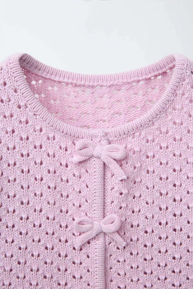 GILET EN MAILLE LACETS DENTELLE