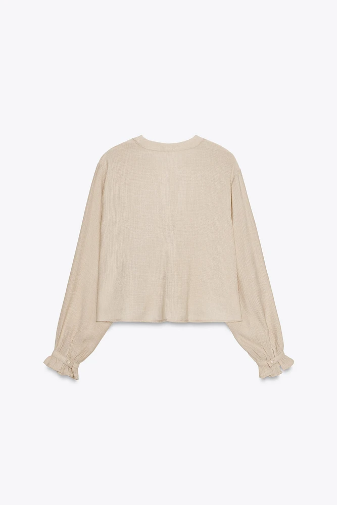 SHORT EMBROIDERED EYELET BLOUSE