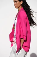 VESTE À MANCHES RETROUSSÉES