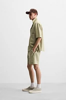 TEXTURED EMBROIDERED SHORTS