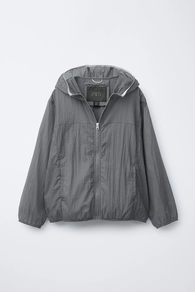 LIGHTWEIGHT PACKABLE WINDBREAKER