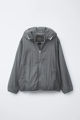 LIGHTWEIGHT PACKABLE WINDBREAKER