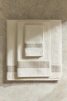 SERVIETTE DE BAIN BORDURE TEXTURE