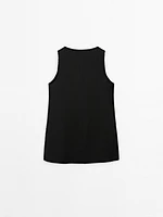 Long sleeveless satin blouse