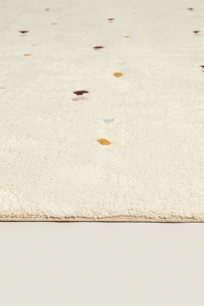 CHILDREN’S MULTICOLORED EMBROIDERED DIAMOND RUG