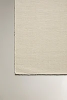 SMALL WOOL AREA RUG WITH WAVY LINES