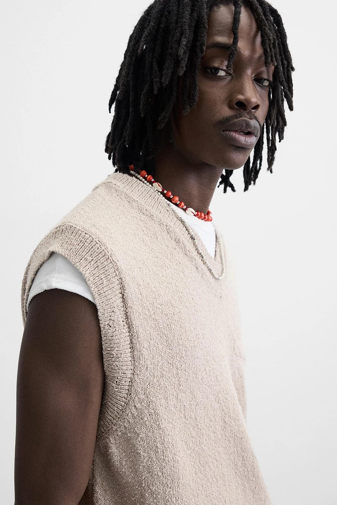 GILET EN MAILLE TEXTURÉE