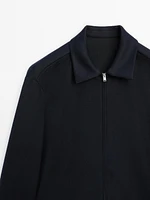 Jacket with adjustable hem detail