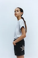 ANIMAL PRINT STAR PATCH DENIM SHORTS