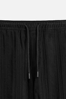 TEXTURED RELAXED FIT PANTS
