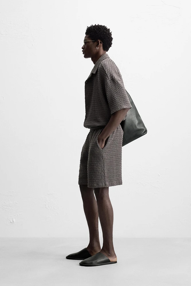 IRREGULAR TEXTURED BERMUDA SHORTS