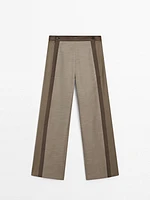 Straight-leg trousers with fastening detail